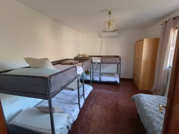 Habitación Infantil Dormitorio infantil con literas para grupos y familias en casa rural Alpujarra